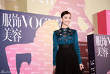 组图：倪妮亮相《Vogue》盛典 端庄大方展自信笑容