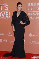 群星闪耀嫣然基金晚宴 王菲旗袍装与李亚鹏恩爱