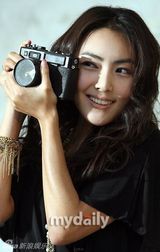 幻灯：洪仁英举行写真集发布会 展现成熟魅力