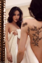 组图：姜欣雨变身摇滚坏女孩 纹身写真极致诱惑