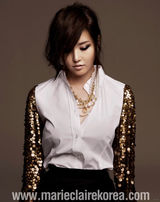 组图：韩星南圭丽(南奎丽)新写真成熟妩媚 化浓妆秀身材