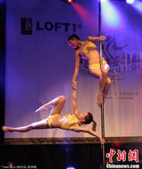 组图：中国钢管舞队首战世锦赛 民族风获第八