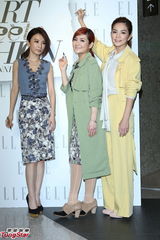 组图：S.H.E合体亮相时尚展靓丽动人