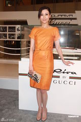 组图：李嘉欣橙色连身裙亮相 曼妙身姿气质不凡