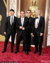 组图：86届奥斯卡红毯星光闪耀 高贵与奇葩并存