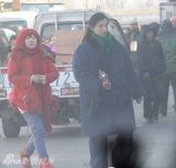 组图：最IN单品军大衣 刘德华范冰冰田亮全靠它