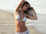 组图：超模伊莎贝儿2013泳装大片曝光 沙滩湿身性感