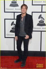 组图：妮可丈夫凯斯-厄本独自亮相 纹身抢眼