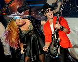 组图：黛米-洛瓦托洛杉矶开唱 挺胸豪唱勾魂四射