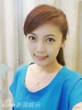 组图：央视女记者艾婷婷美胸抢镜 掀网络热议