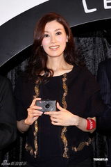 组图：李嘉欣大腹便便出席活动 透露要剖腹产