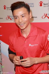 组图：应采儿张晋出席活动大谈育儿心得