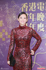 组图：章子怡火红包身裙挽手梁朝伟 宗师夺4奖