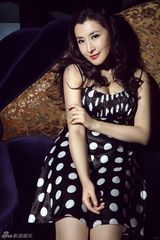 组图：王雅捷优雅写真展熟女风 复古时尚揭冬日暖意