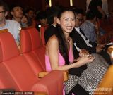 组图：张柏芝助阵新片戛纳首映粉裙摇曳多姿