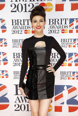 高清图：维多利亚-嘉丝蒂黑色短裙亮相身材窈窕