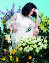 组图：许晴春意大片花仙子笑容迷人