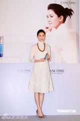 幻灯图：袁咏仪做活动着装典雅 曝张家辉在家没地位