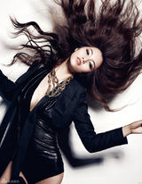 组图：田蕾希黑衣写真性感冷艳野性十足