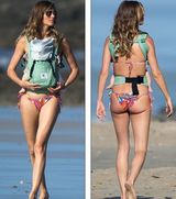 组图：名模吉赛尔比基尼胸前挂宝宝显辣妈风范