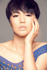 组图：亚运推广大使谭维维时尚造型大片曝光