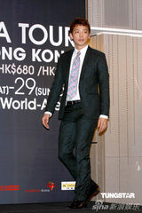 幻灯组图：Rain抵港为个唱造势 拒谈问题忙离场