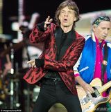 组图：滚石米克之子现身机场 与父相似度达99%