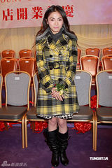 幻灯：张卫健澄清婚变传闻 小柏芝贡米亮相香江