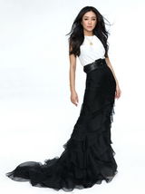 组图：秦岚连登两本杂志亦动亦静风情迷人