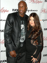 幻灯图集：好莱坞星踪集锦 贾斯汀挥杆为慈善