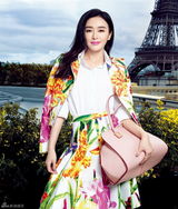 组图：秦岚明亮彩衣登封面 背靠巴黎塔神采飞扬
