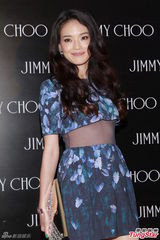 组图：舒淇性感露腰装露下半球胸线