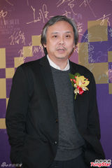 组图：章子怡火红包身裙挽手梁朝伟 宗师夺4奖