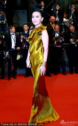 组图：梁朝伟夫妇戛纳走红毯 刘嘉玲金裙气场足