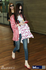 组图：韩团f(x)为K-POP公演现身上海机场