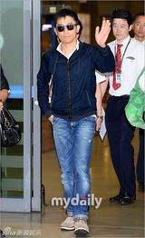 组图：梁朝伟章子怡飞抵韩国参加中国电影节