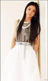 组图：汤唯白色裙装拍写真 气质优雅清纯可人