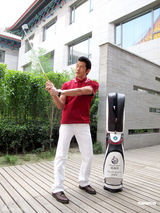 幻灯图：郭富城捧场明星高球赛 接受伍兹前教练特训