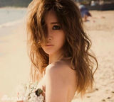 组图：日女星全裸写真遭炮轰 网友称其枉为人母