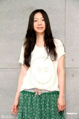 幻灯组图：万芳五年后发新专辑 着绿色长裙春意盎然