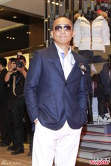 组图：梁朝伟新造型变秃头 亮相某品牌开幕礼