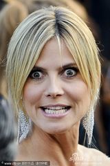 组图：超模海蒂戛纳走秀礼服露背身材高挑