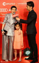 组图：《合伙人》首映红毯 陈可辛全家赴京支持