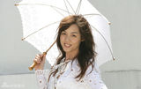 幻灯组图：前超女陈怡素颜拍写真 白伞白衣清纯