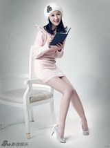 幻灯图：甘薇恬静写真显清丽 白色精灵动人心弦