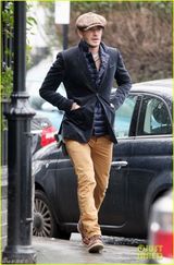 组图：贝克汉姆装扮绅士天冷狂奔