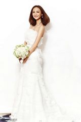 组图：张歆艺披婚纱登封面 娇媚新娘幸福绽放