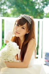 高清图：俏主播王婧关岛写真 祝福虎年恭贺新春