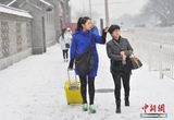 组图：高校艺考大幕开启 美女帅哥冒雪赶考