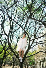 组图：郑斯仁白衣写真 演绎仙境精灵王子